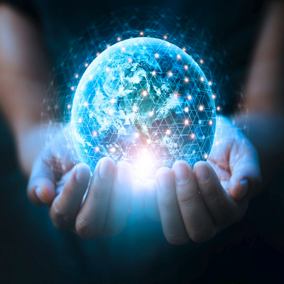 Man's hands holding the blue earth